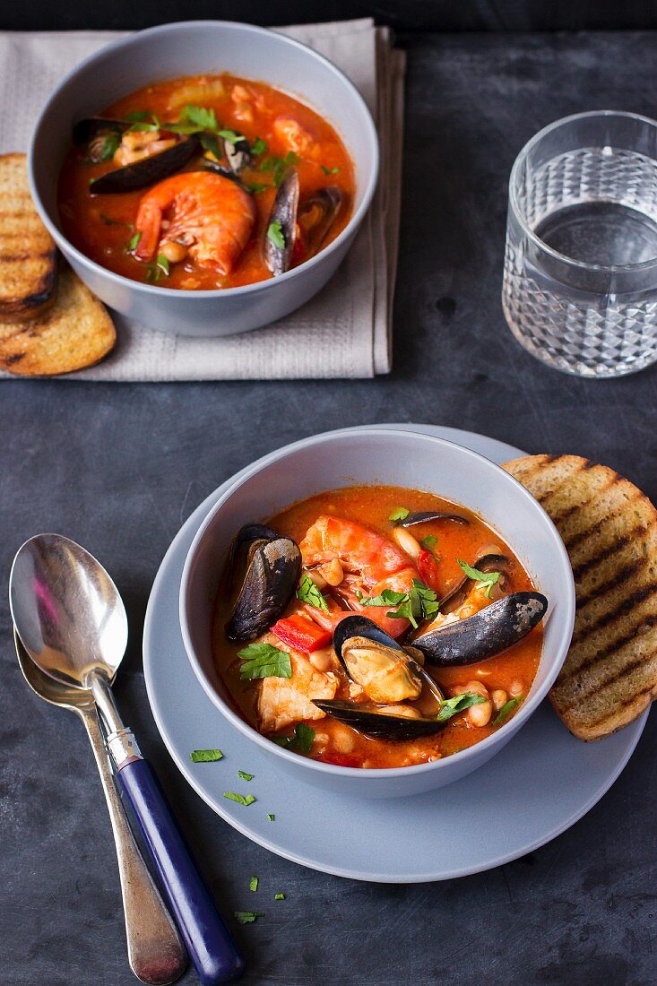 Seafood soup with mussels, prawns and parsley