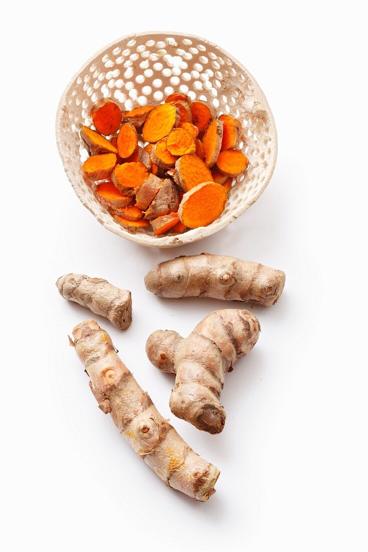 Turmeric, whole and sliced