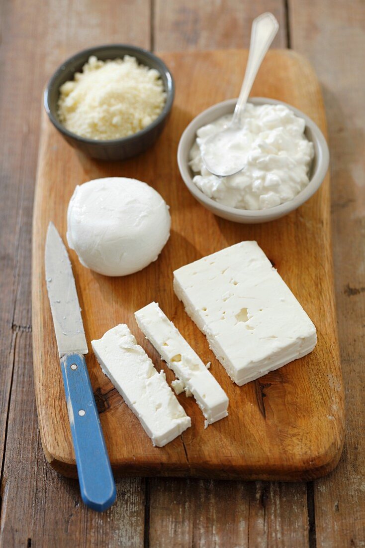 An arrangement of cheese with feta, buffalo mozzarella, cottage cheese and pecorino
