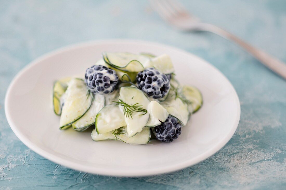 Cucumber salad with blackberries, yoghurt and dill