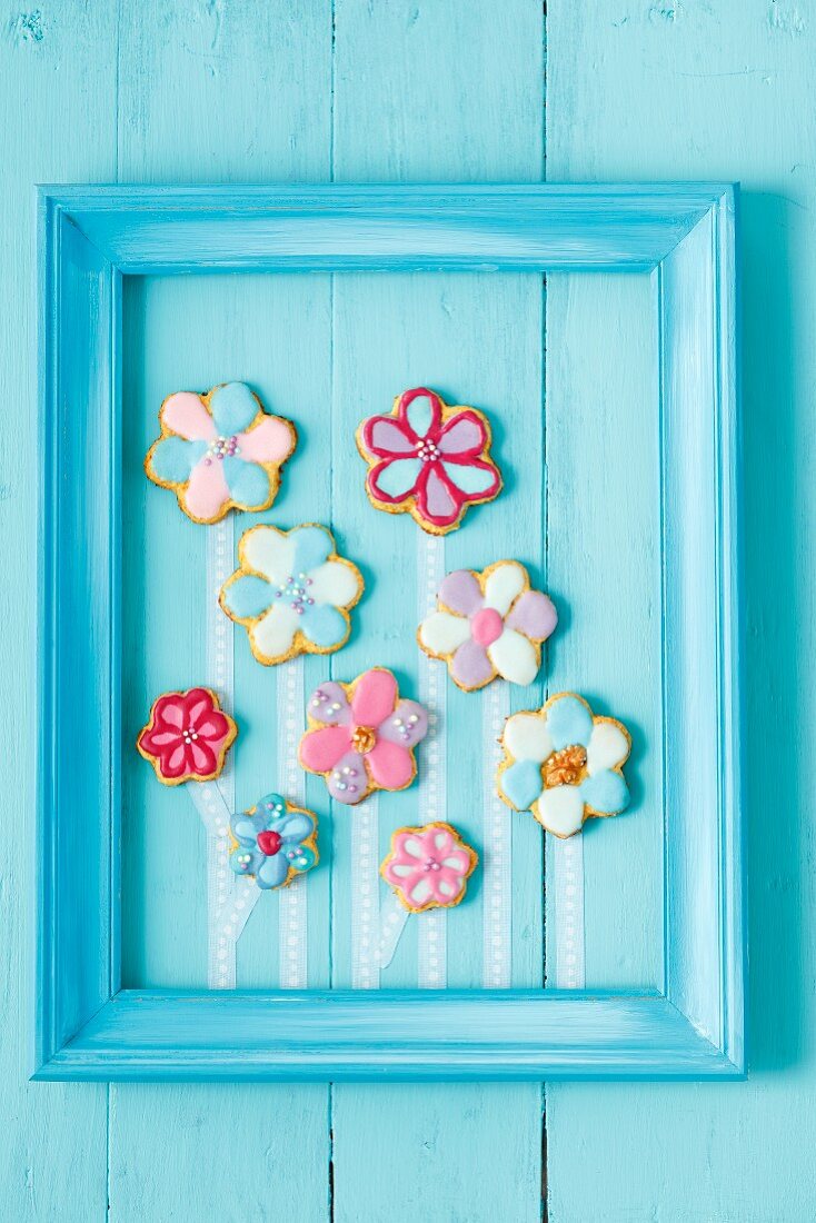 Flower shaped biscuits with colourful icing
