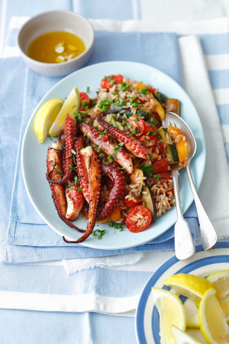 Grilled octopus with rice and vegetables