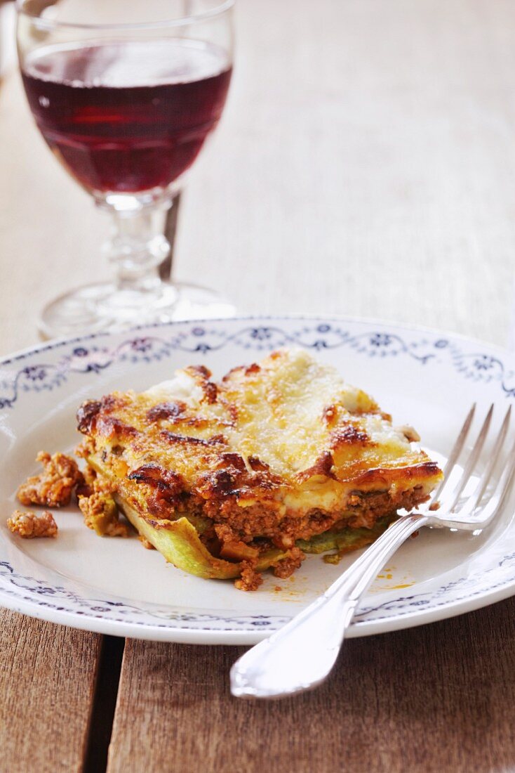 A portion of lasagne with minced meat and béchamel sauce