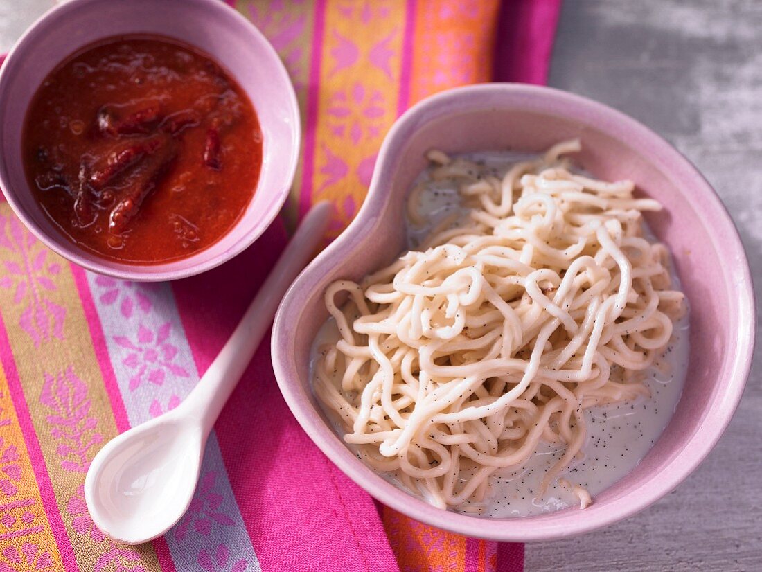 Sweet mie noodles with vanilla and damson compote