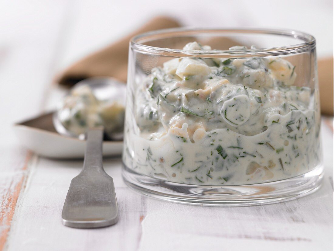 Homemade remoulade with egg, onions and herbs