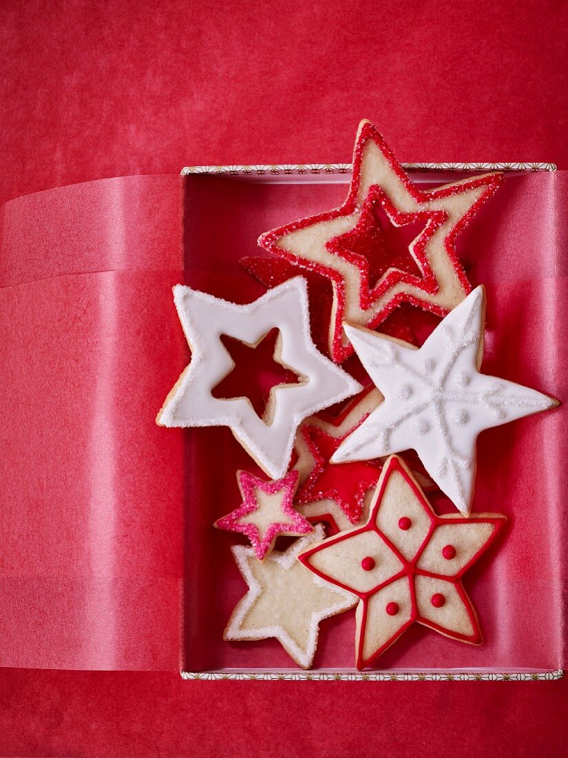 Red and white Christmas star biscuits in a gift box