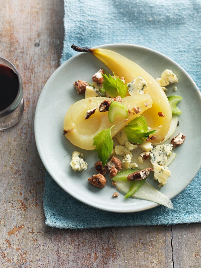 Poached pear with Stilton, celery and nuts