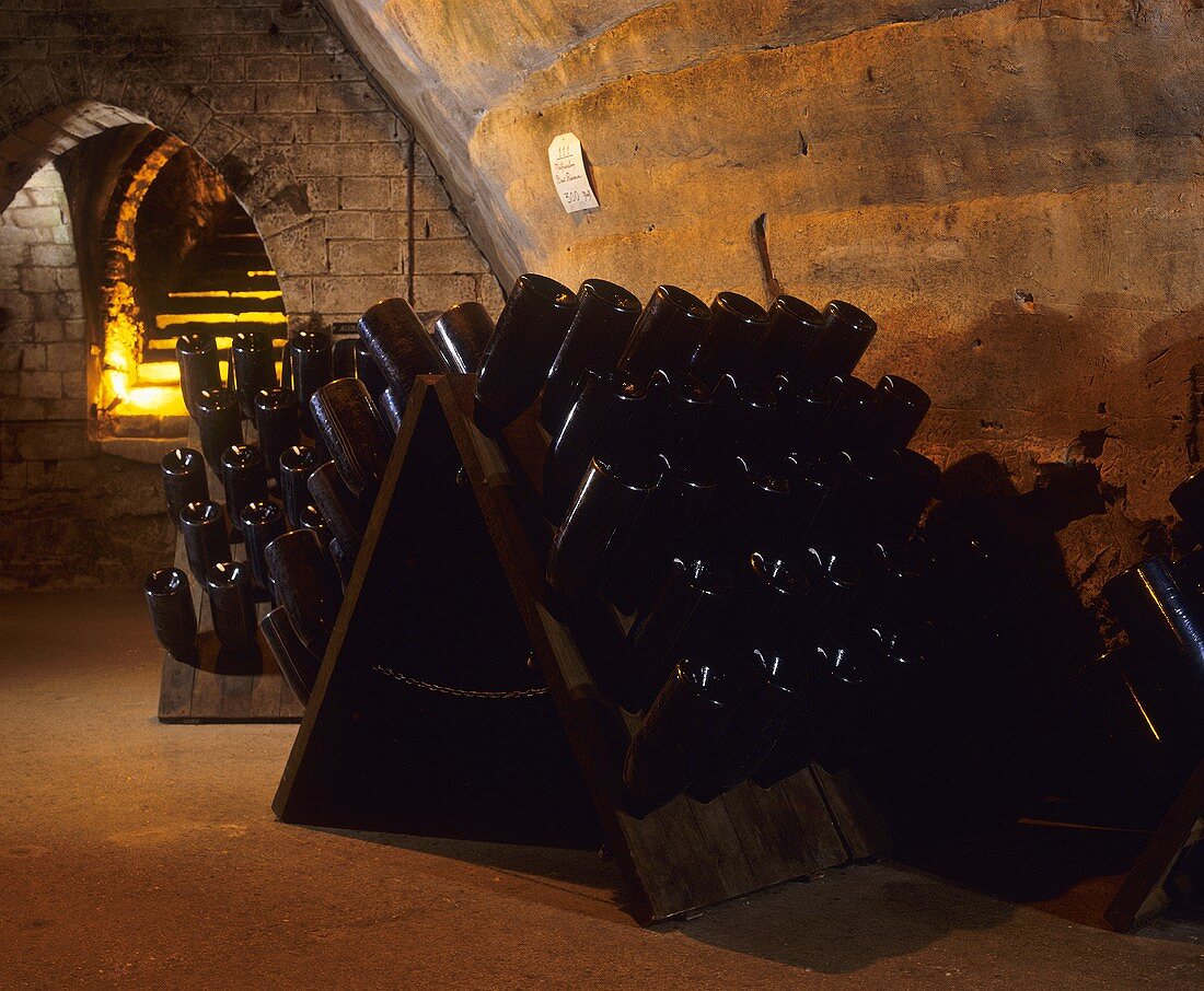 Champagne bottles in traditional pupitre, France