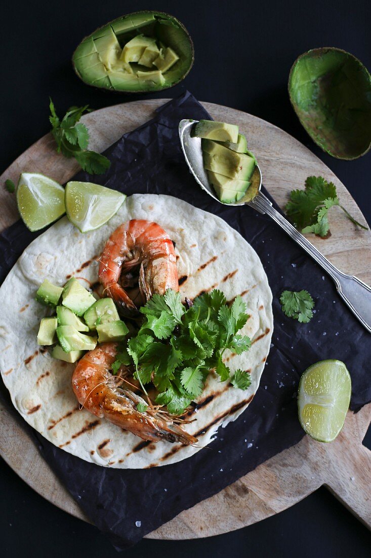 Shrimp tacos with lime, avocado and coriander