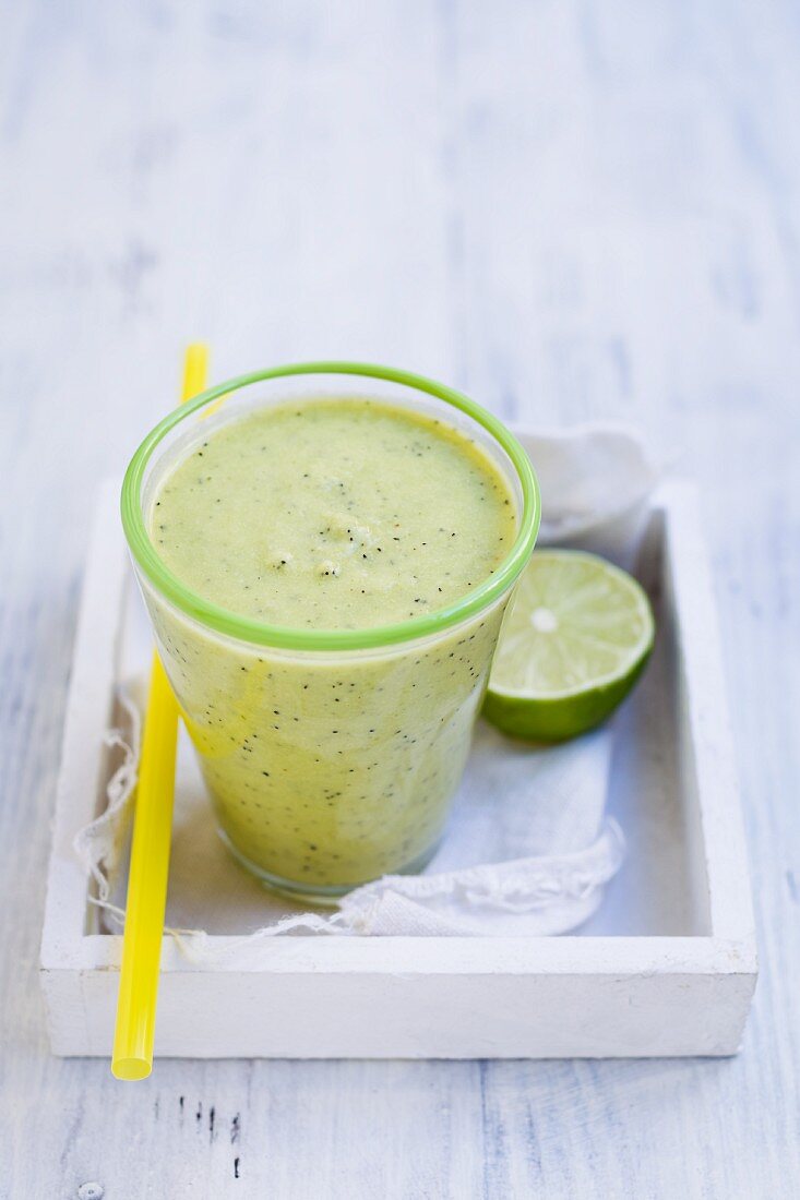 A pineapple and kiwi smoothie made with coconut water