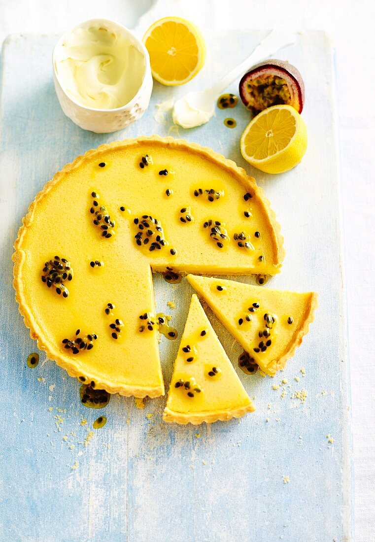 Lemon and passion fruit tart, sliced