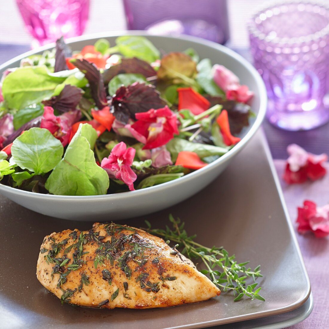 Grilled chicken breast with a mixed salad