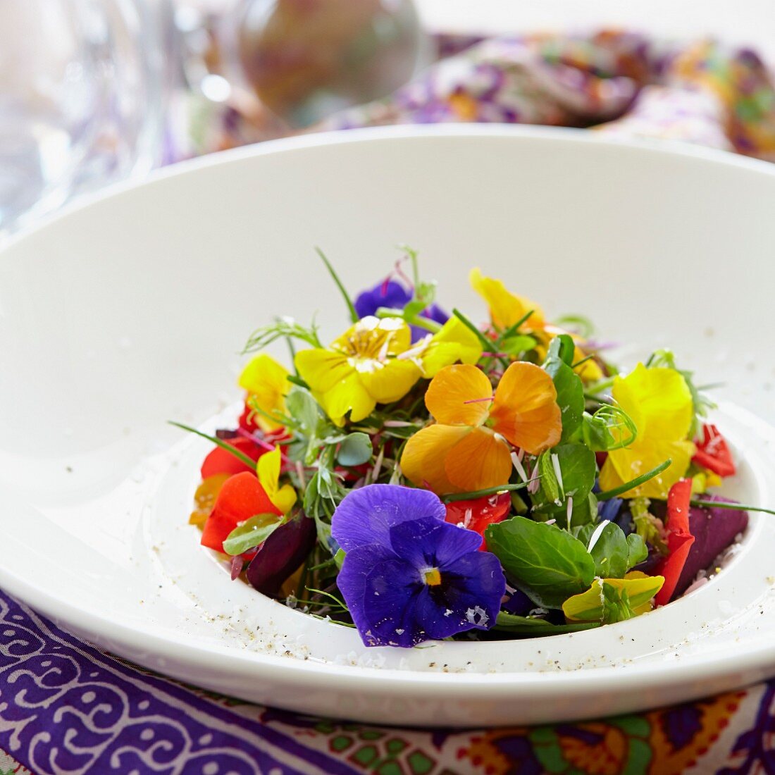 A colourful edible flower & herb salad