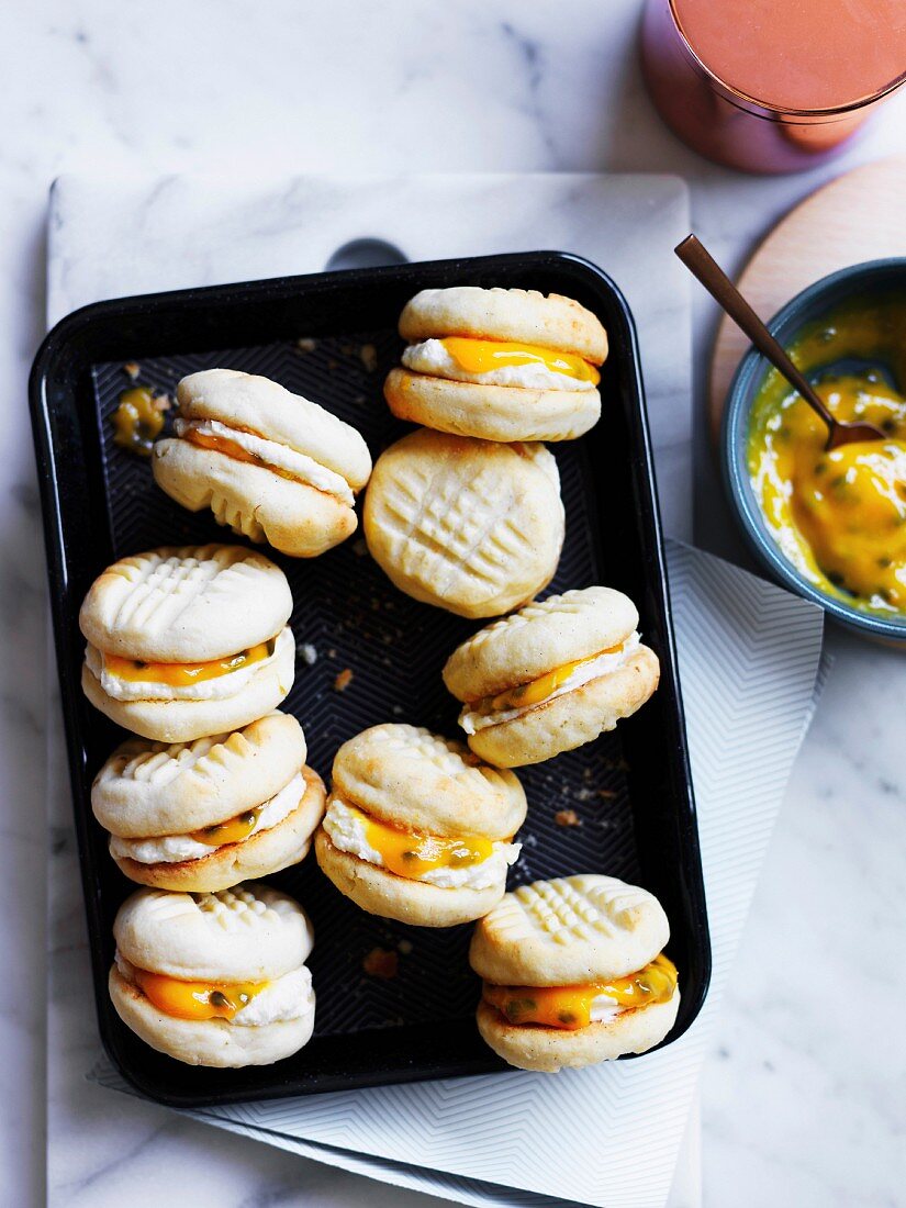 Lime and valinna yo-yos with passionfruit curd