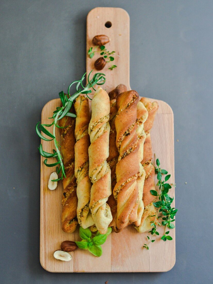 Twisted doughsticks with herbs andt toasted hazelnuts