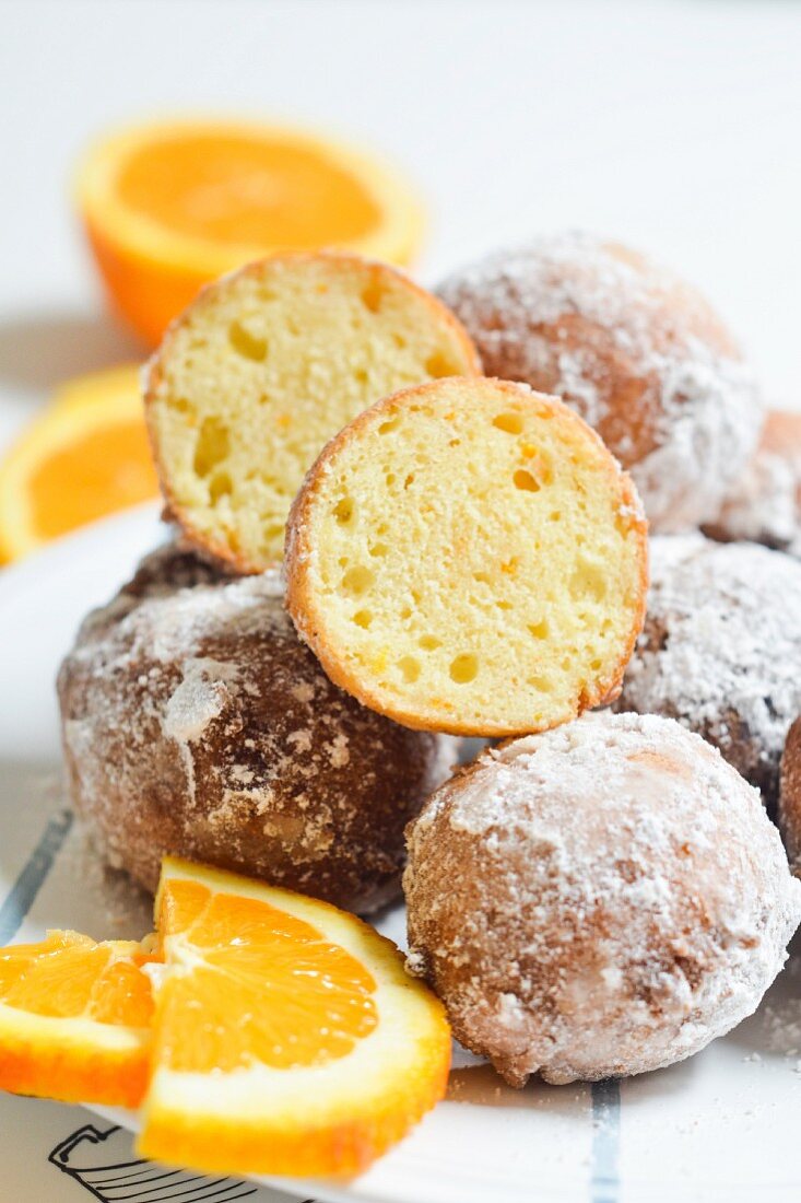 Freied ricotta & orange doughballs rolled in icing sugar