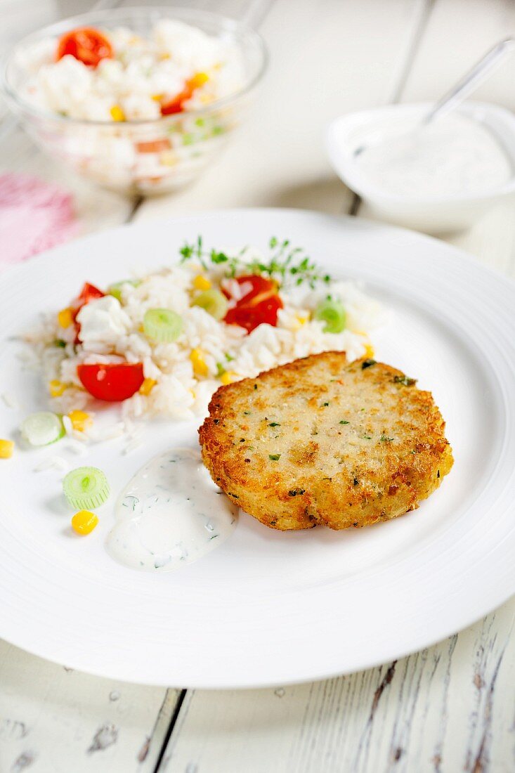 Hake patties with vegetable rice
