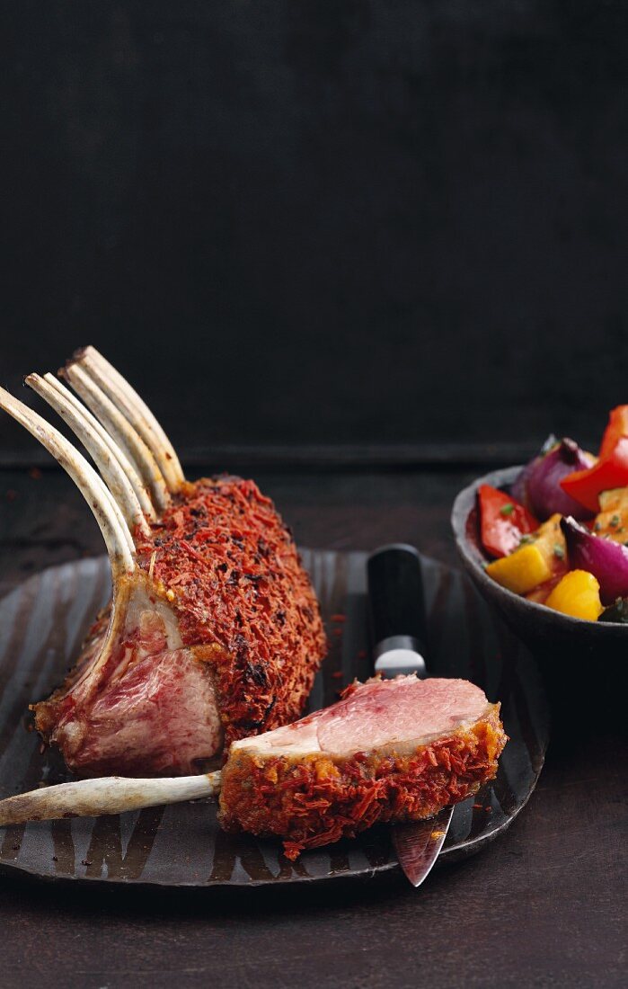 A rack of lamb with a tomato & sage crust