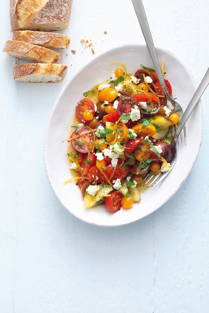 Colourful tomato salad with sheep's cheese