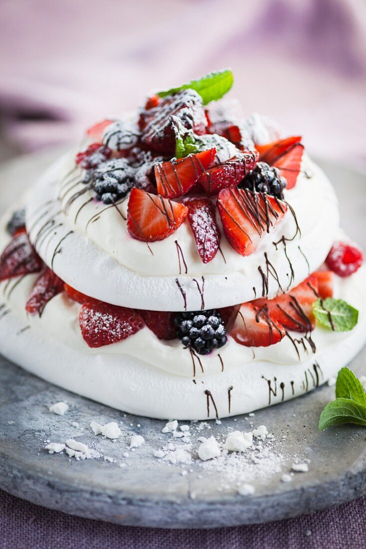 Pavlova with berries and mint