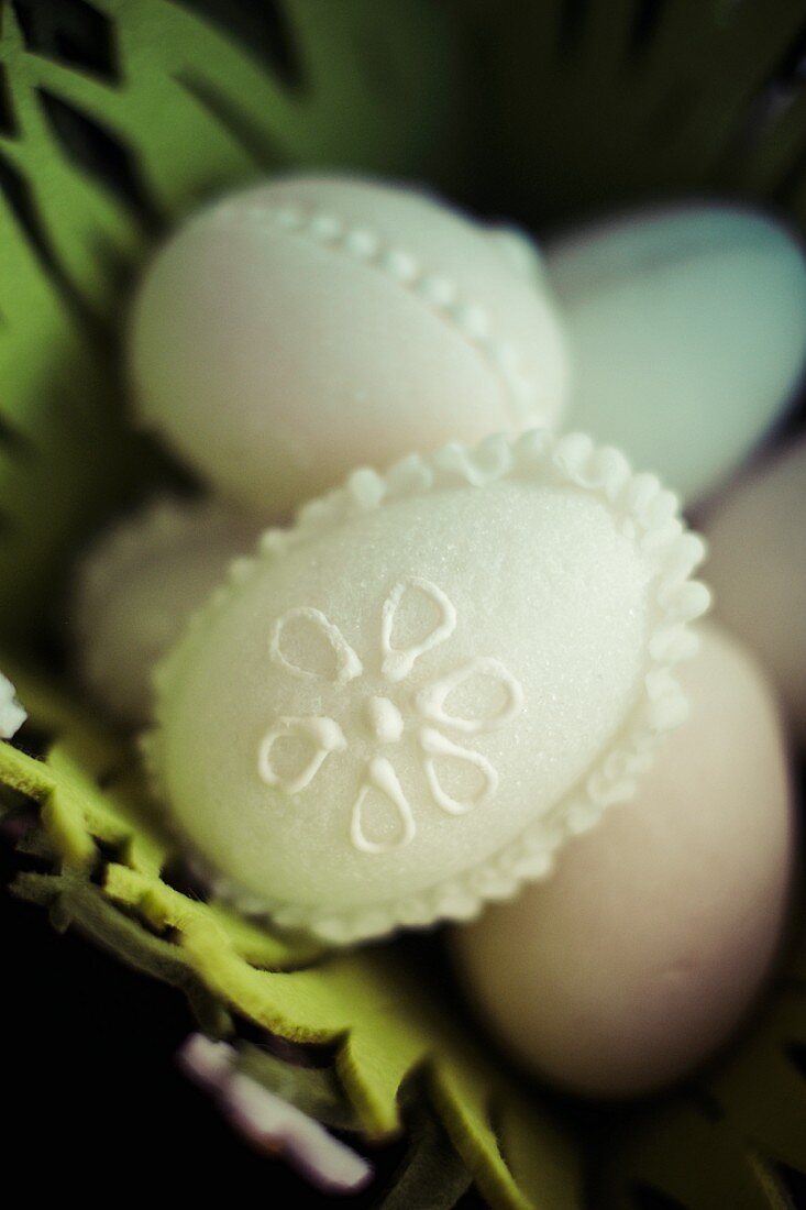 Pastel coloured sugar eggs (close up)