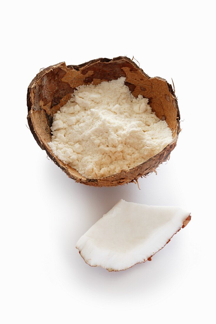 Coconut flower in a coconut shell