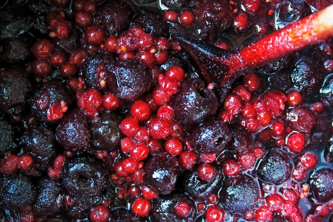Red fruit jelly being made