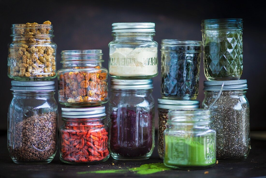 Various ingredients in screw top jars for superfood recipes