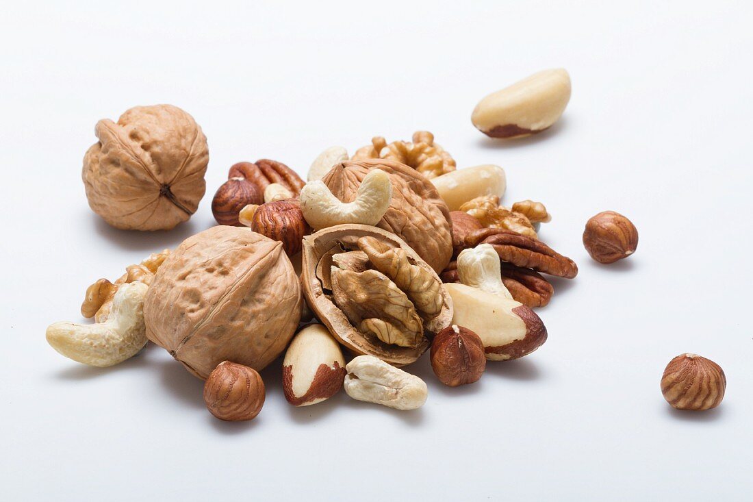 Various nuts on a white surface