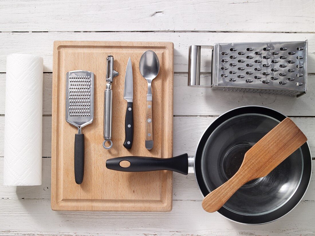 Assorted kitchen utensils for preparing fritters