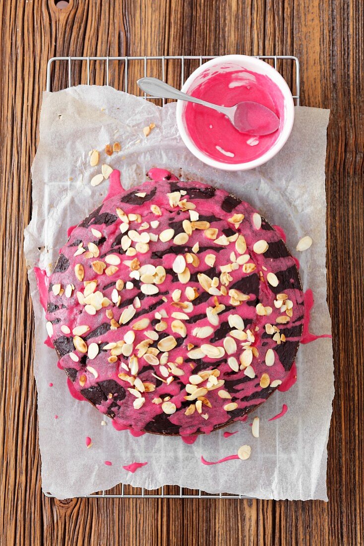 Beetroot brownies with beetroot icing and flaked almonds