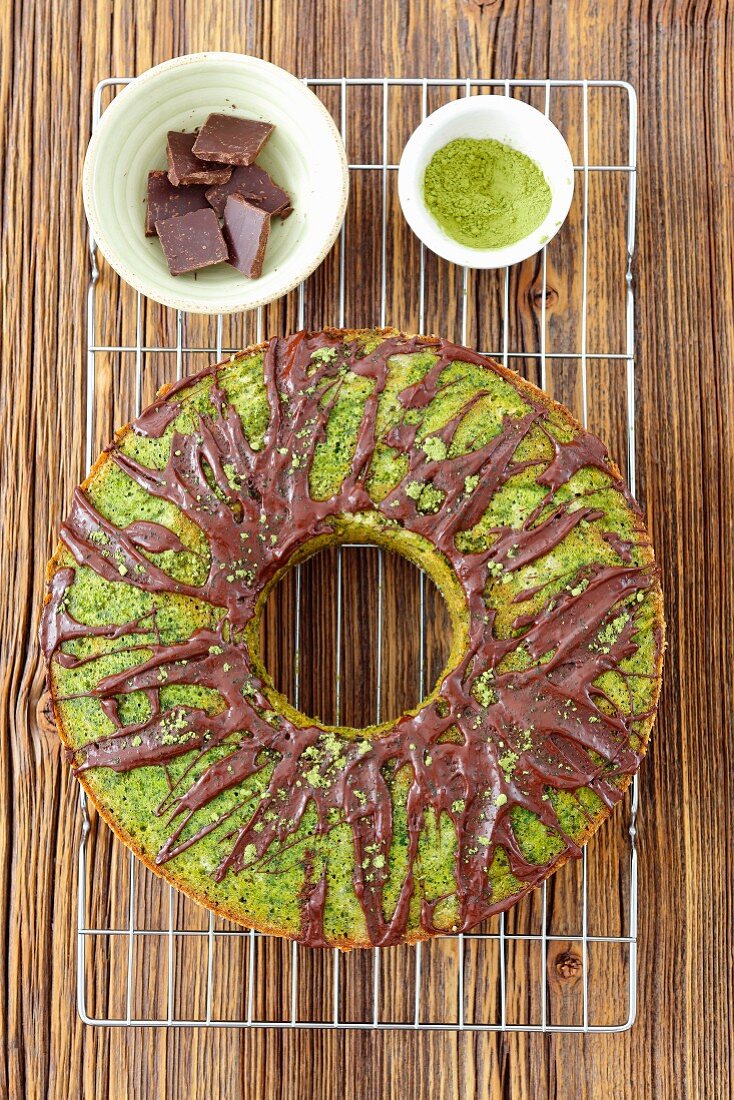 Sweet spinach cake with matcha tea and chocolate glaze