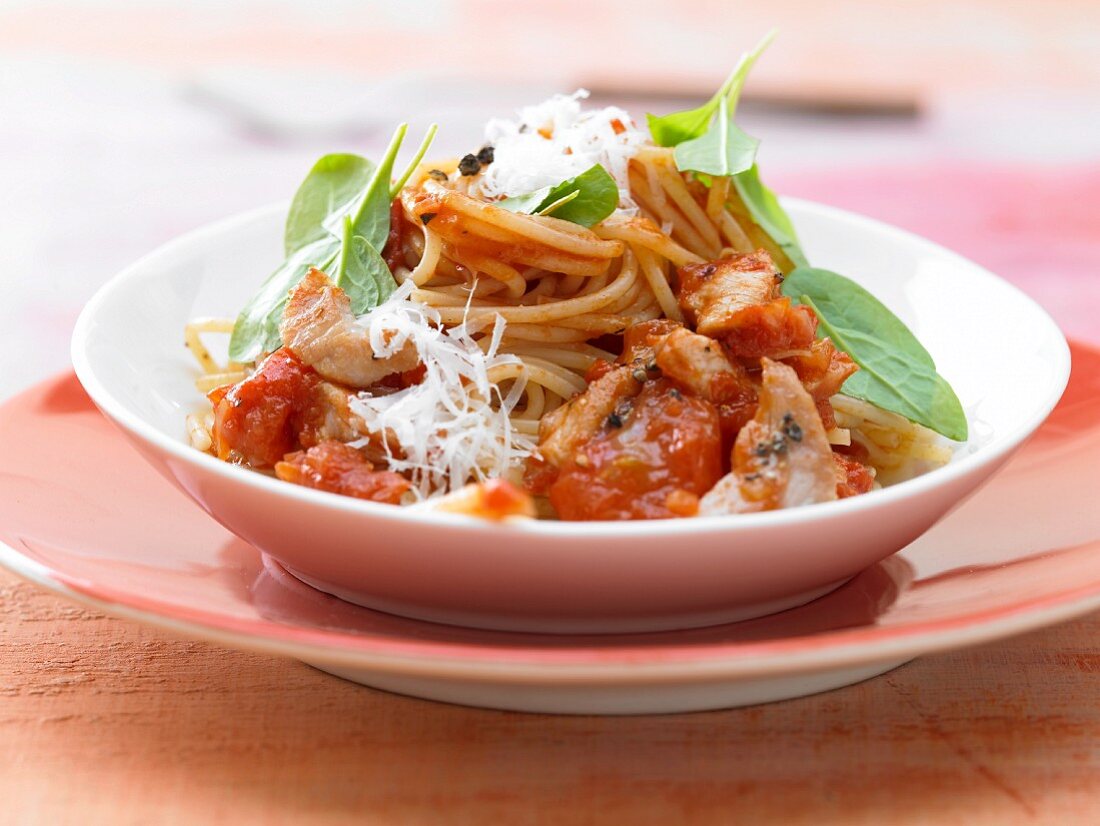 Spaghetti with tomato sauce and turkey breast strips