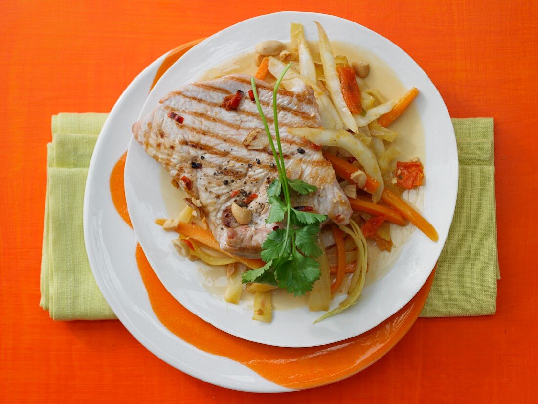 Cabbage and coconut curry with grilled turkey escalopes