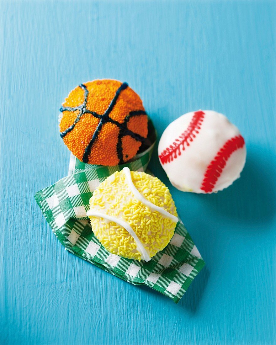 Sports cupcakes (cricket ball, tennis ball and basketball)