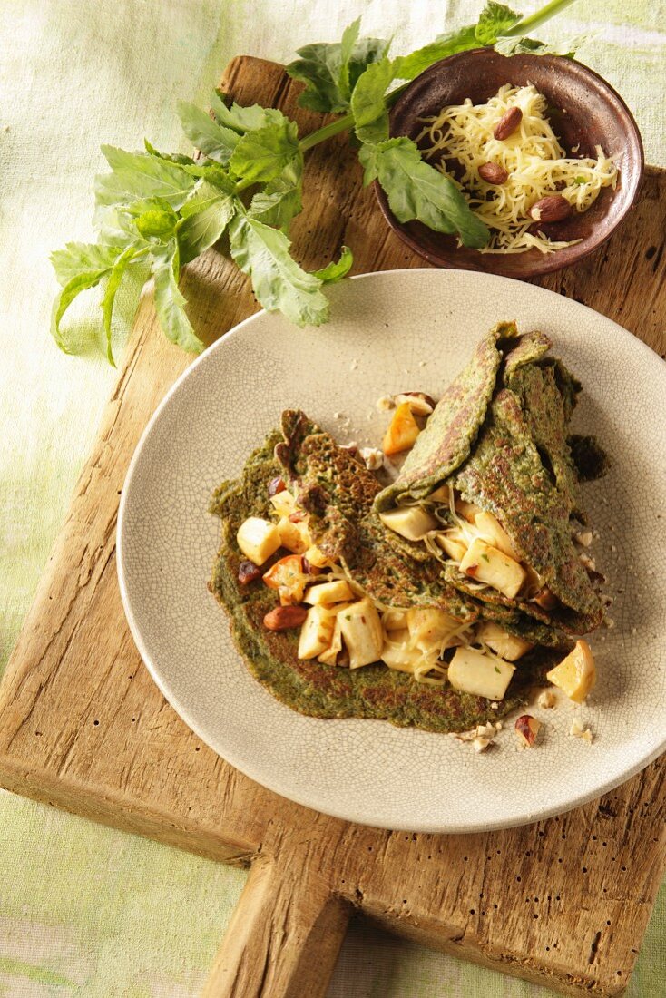Herb pancakes with parsnip and hazelnuts