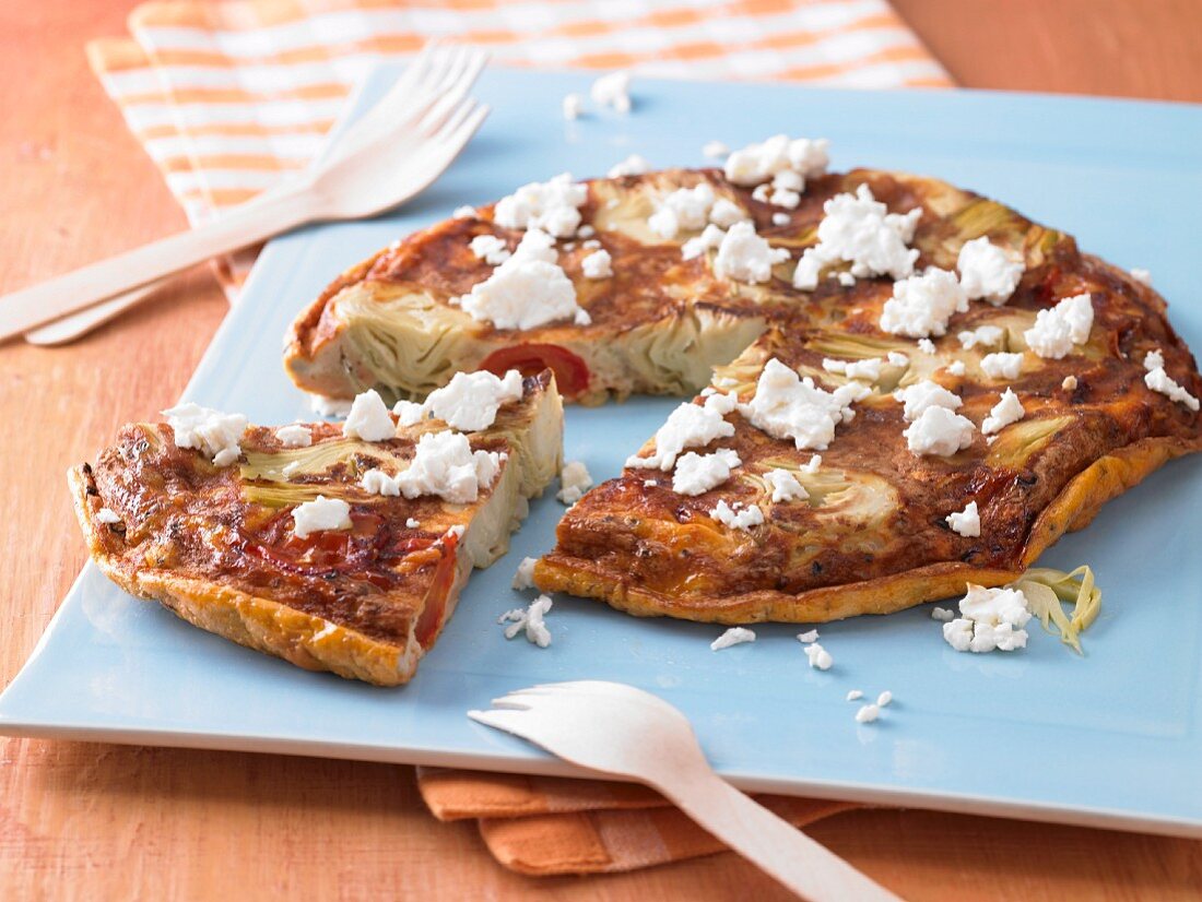 Artichoke tortilla with tomato and sheep's cheese