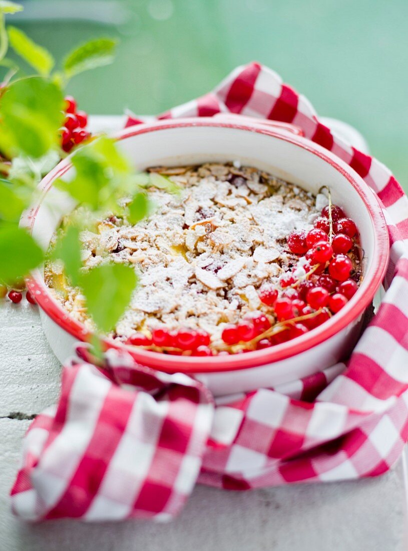 Baked porridge oats with redcurrants