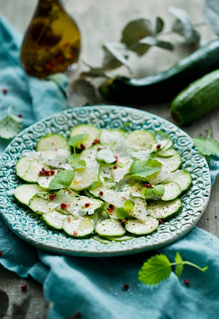 Courgette carpaccio with chilli flakes and herbs
