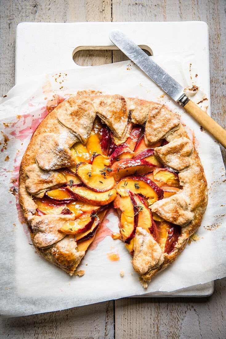 A nectarine galette with a slice removed (seen from above)