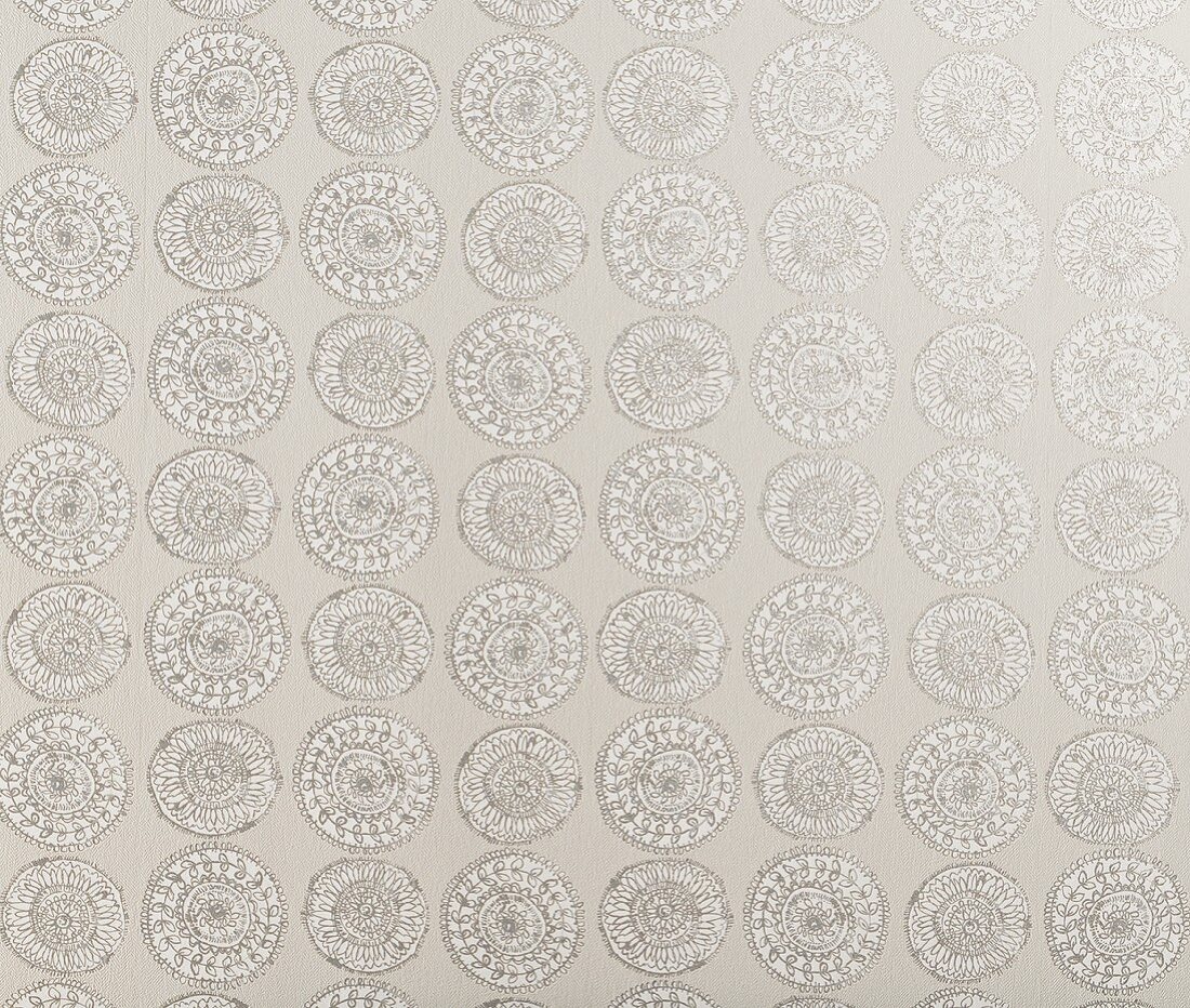 A rose-like wallpaper pattern in shades of grey