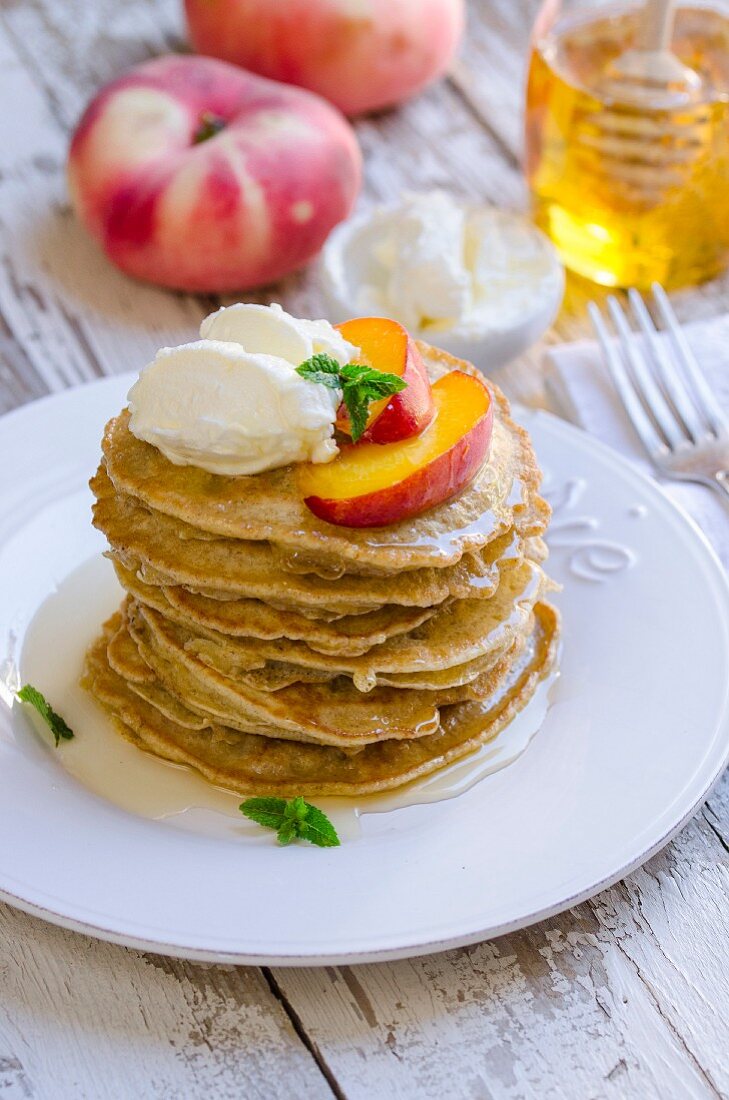 Pancakes with peach, cream cheese and honey