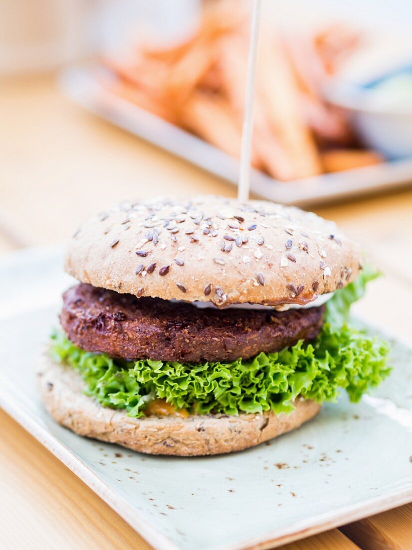 A vegetarian burger in a wholemeal bun