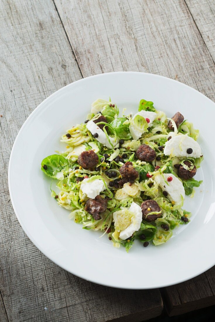 Brussels sprout salad with goats' cheese and Cicit (goat sausage from Ticino)