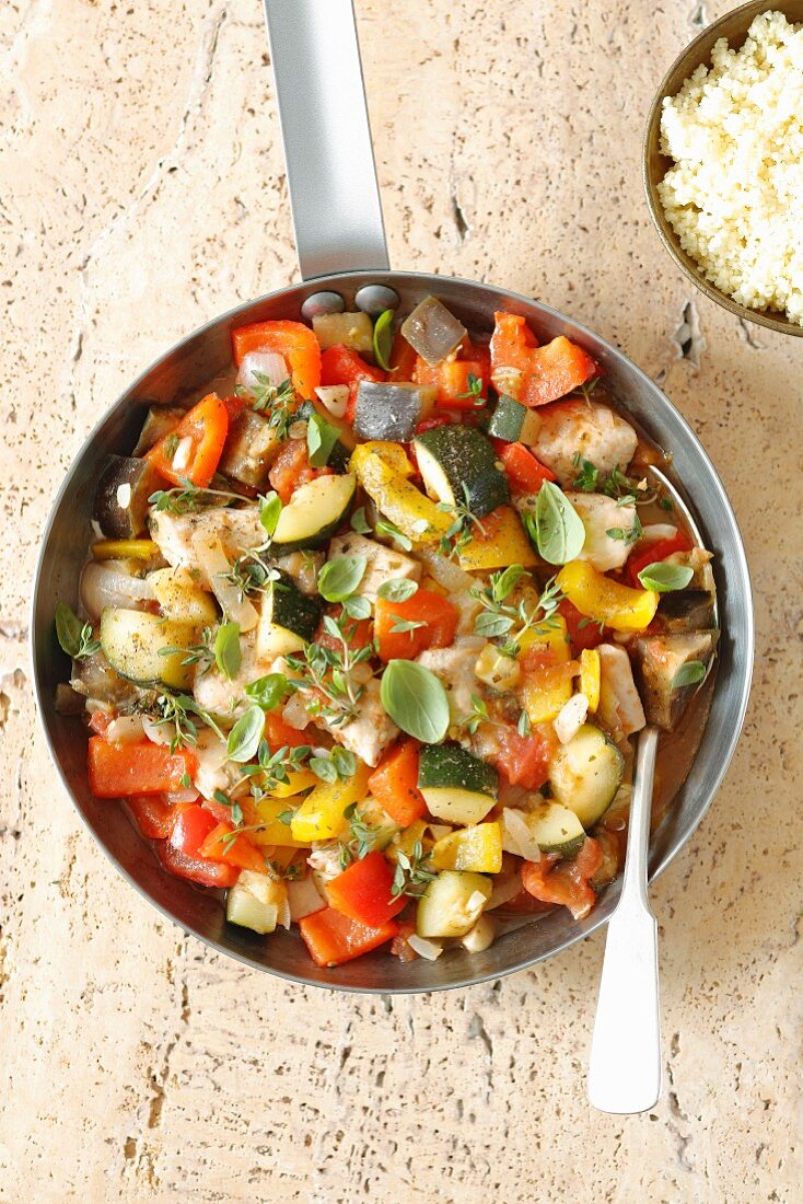 Braised chicken breast with vegetable ratatouille (pepper, aubergine, courrgette and tomatoes)