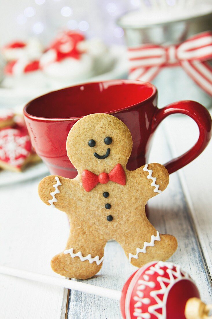 Gingerbread man and red mug