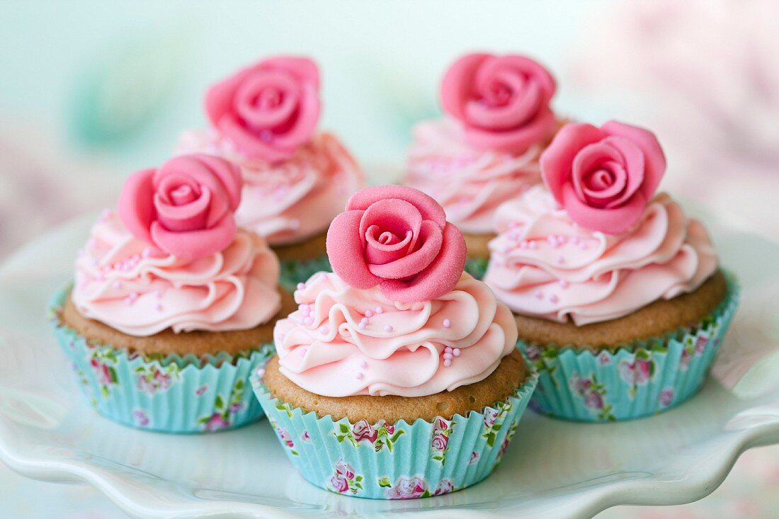Cupcakes decorated with sugar roses