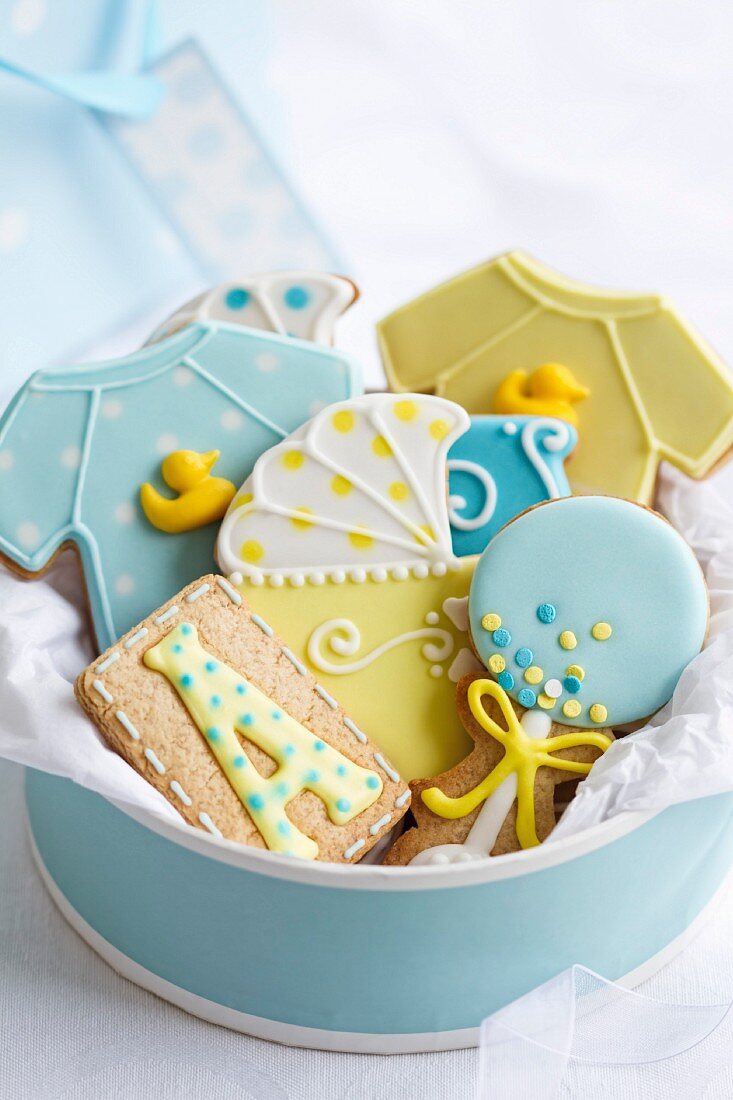 Gift box filled with baby shower cookies