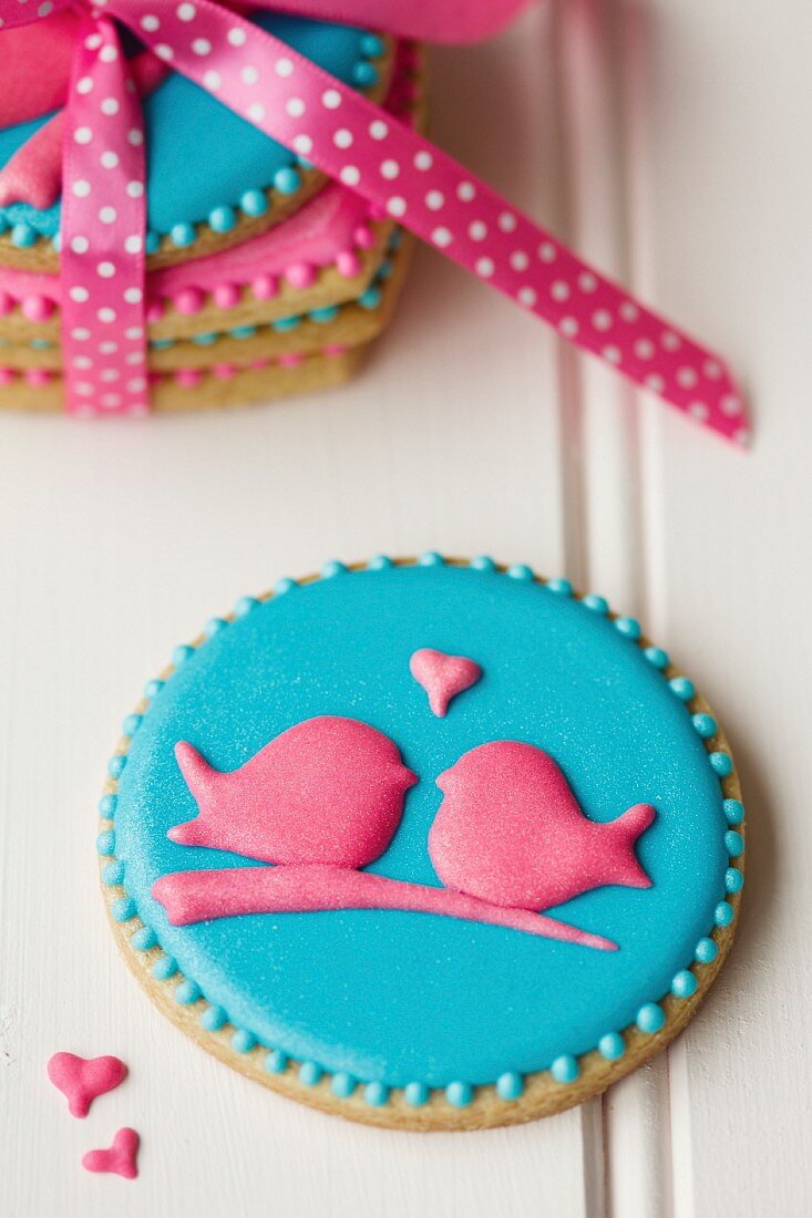 Lovebird cookies tied with a ribbon