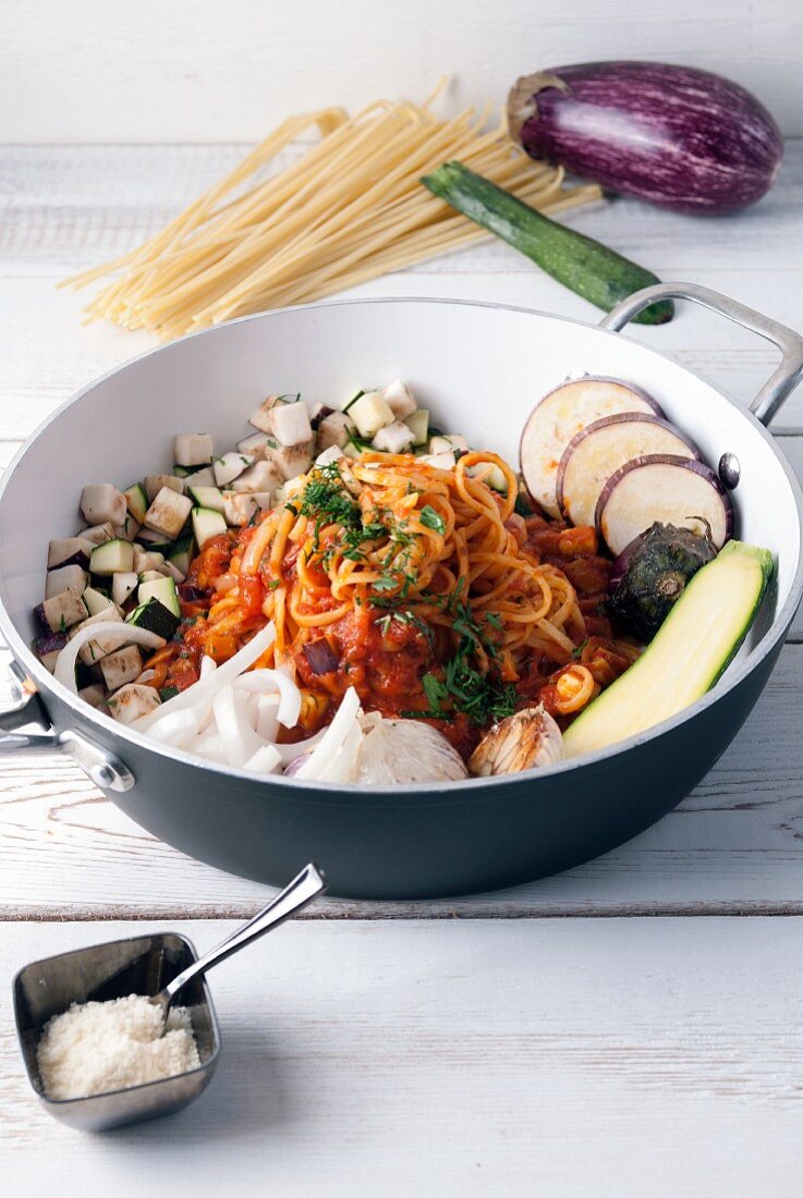 One-pot pasta with aubergine, courgette, garlic and Parmesan